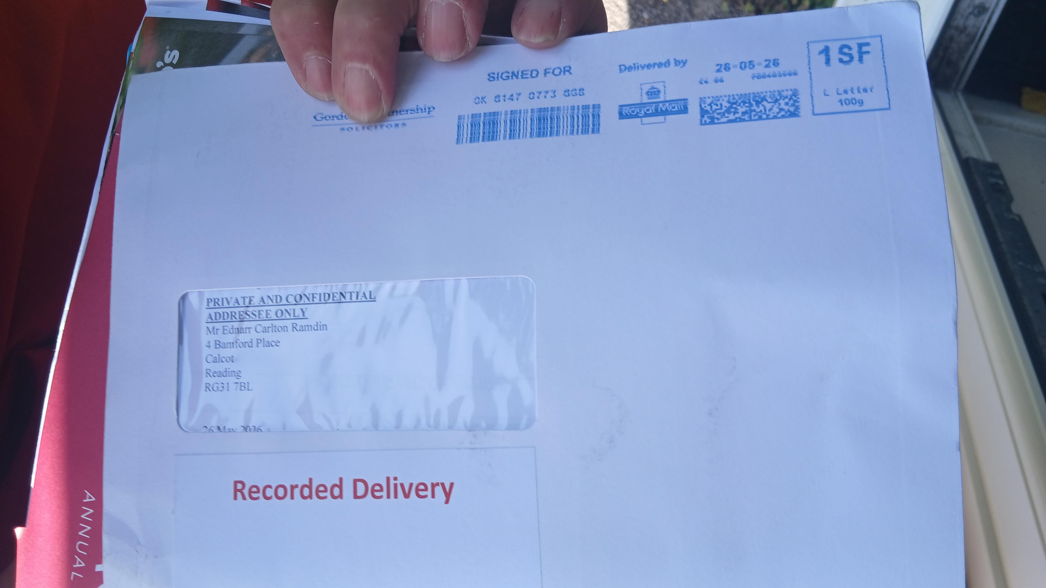 EX03 – General Form of Judgment or Order – Gordons correspondence photographs dated 11 May 2026 and 26 May 2026 showing ordinary letterbox delivery and separate signed-for correspondence including refused delivery. Establishes separate solicitor communication processs, physical delivery, signed-for correspondence, and refused delivery.